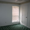 Second bedroom in the Watauga rental house. There are ceiling fans in every bedroom.